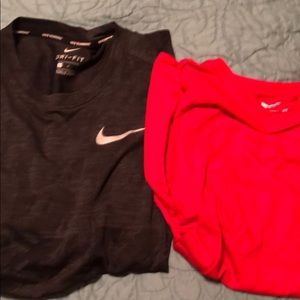 Two Nike shirts